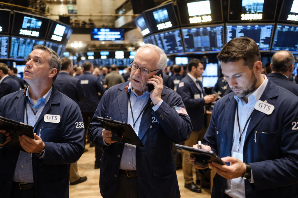 Dow rises nearly 100 points as AI chip stocks rally despite US-Iran tensions